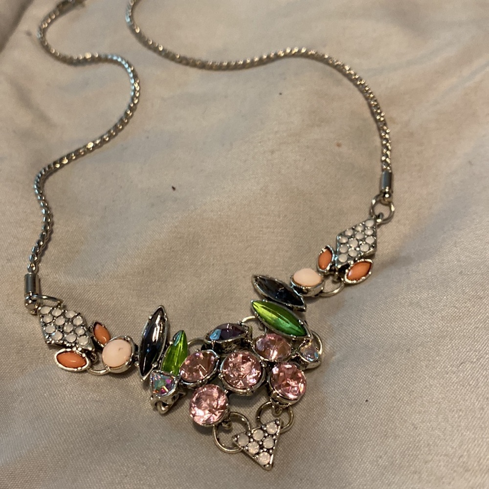 16” silver plated chain holds this awesome bib. $15.00 - Picture 3 of 4